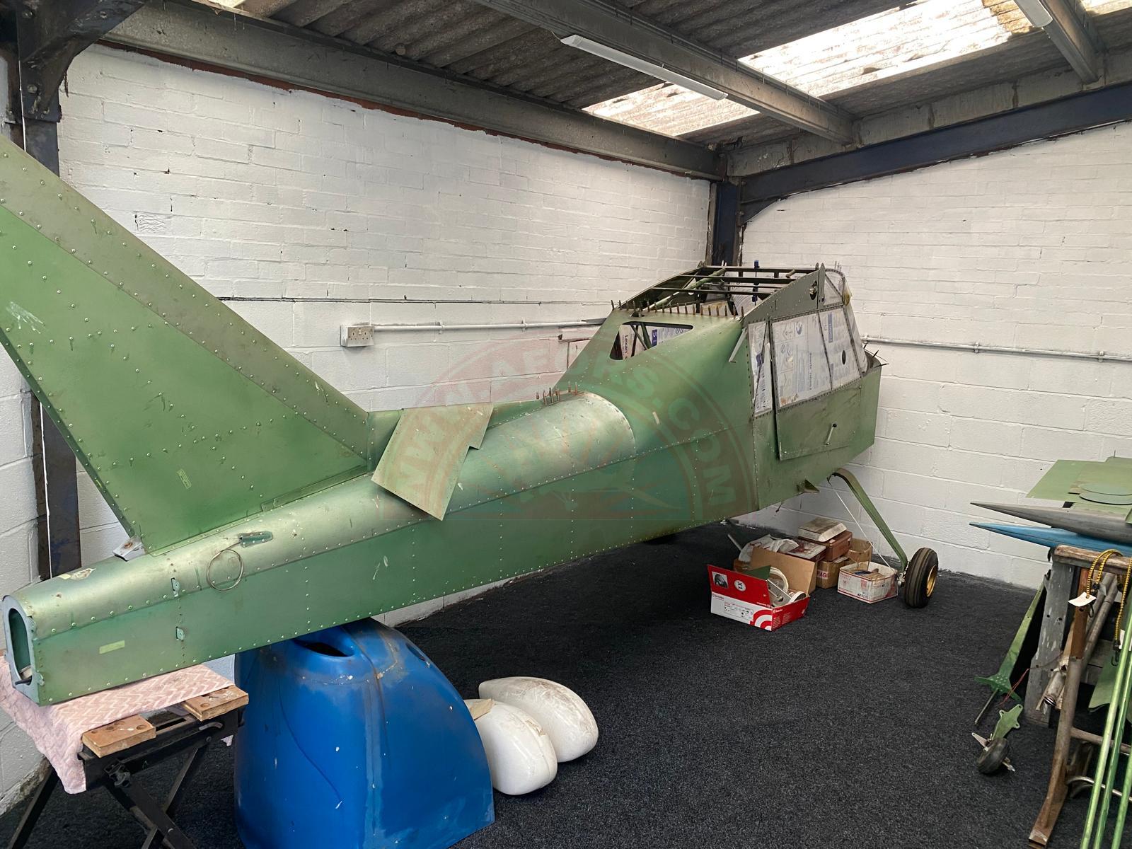 The sun shines on the mountains and trees (by Adam Kool on Unsplash)