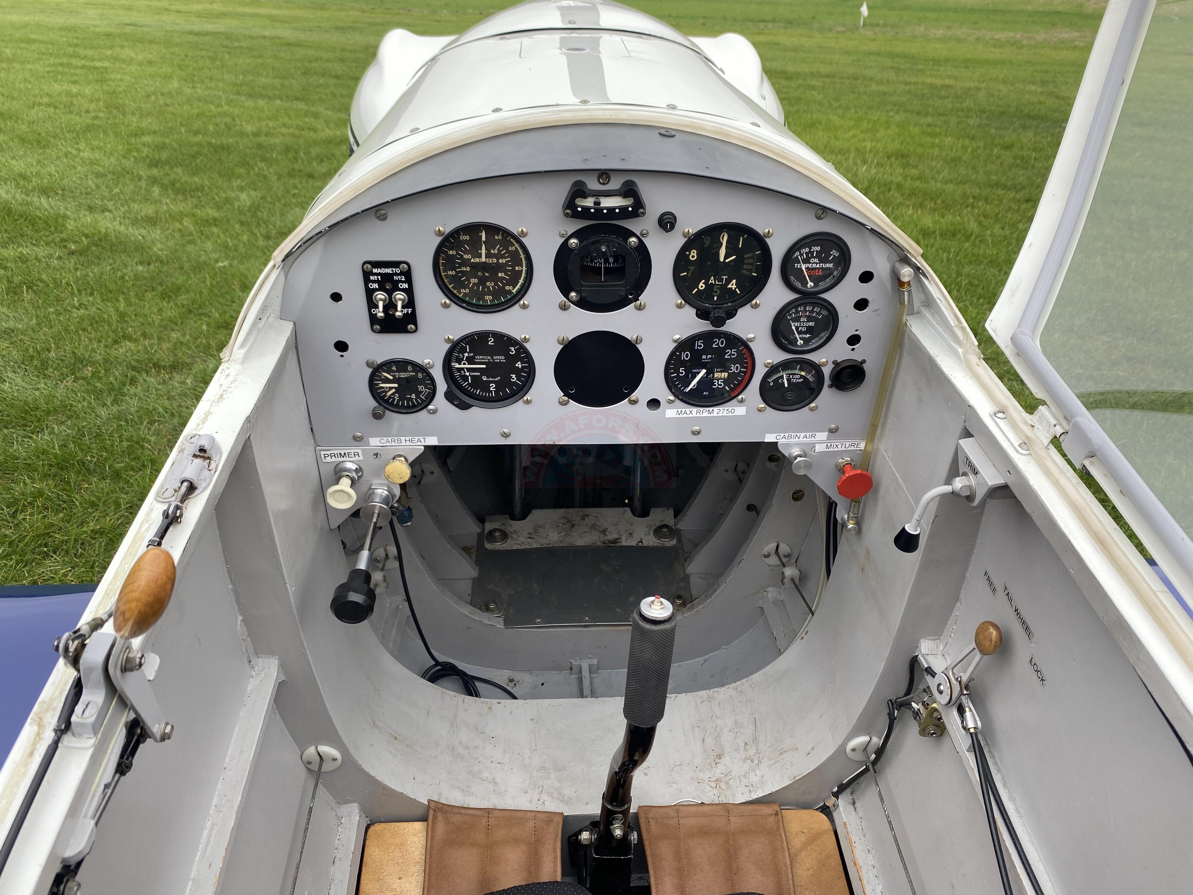 The sun shines on the mountains and trees (by Adam Kool on Unsplash)