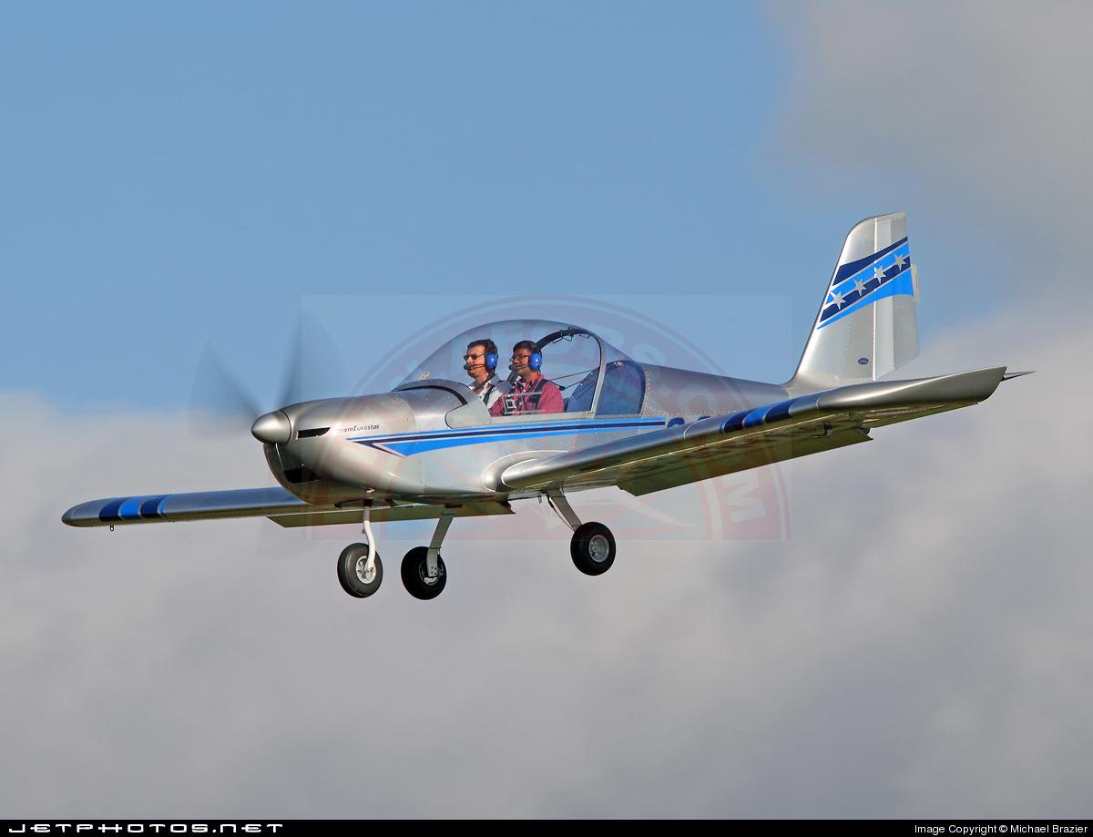 The sun shines on the mountains and trees (by Adam Kool on Unsplash)