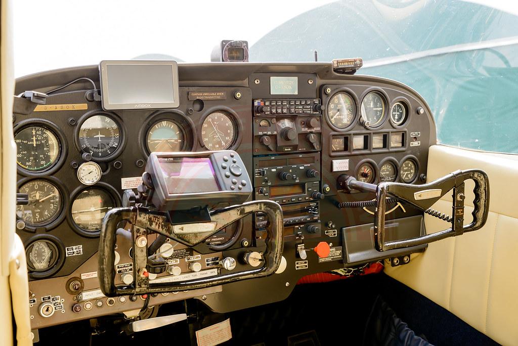 The sun shines on the mountains and trees (by Adam Kool on Unsplash)