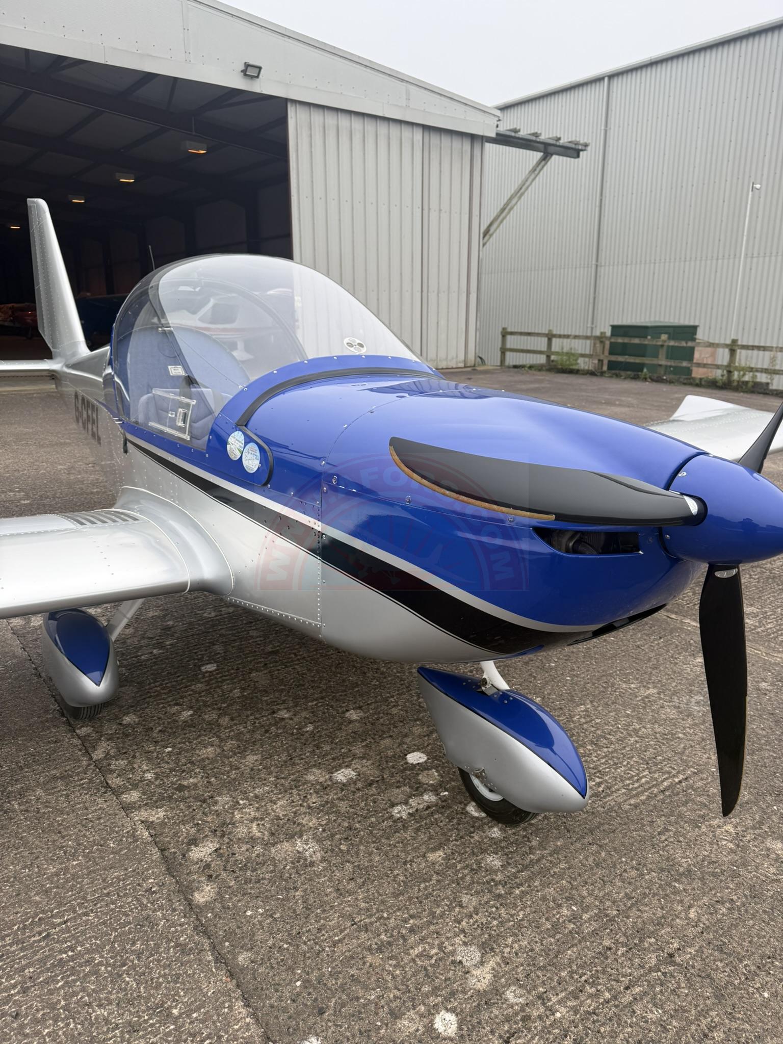 The sun shines on the mountains and trees (by Adam Kool on Unsplash)