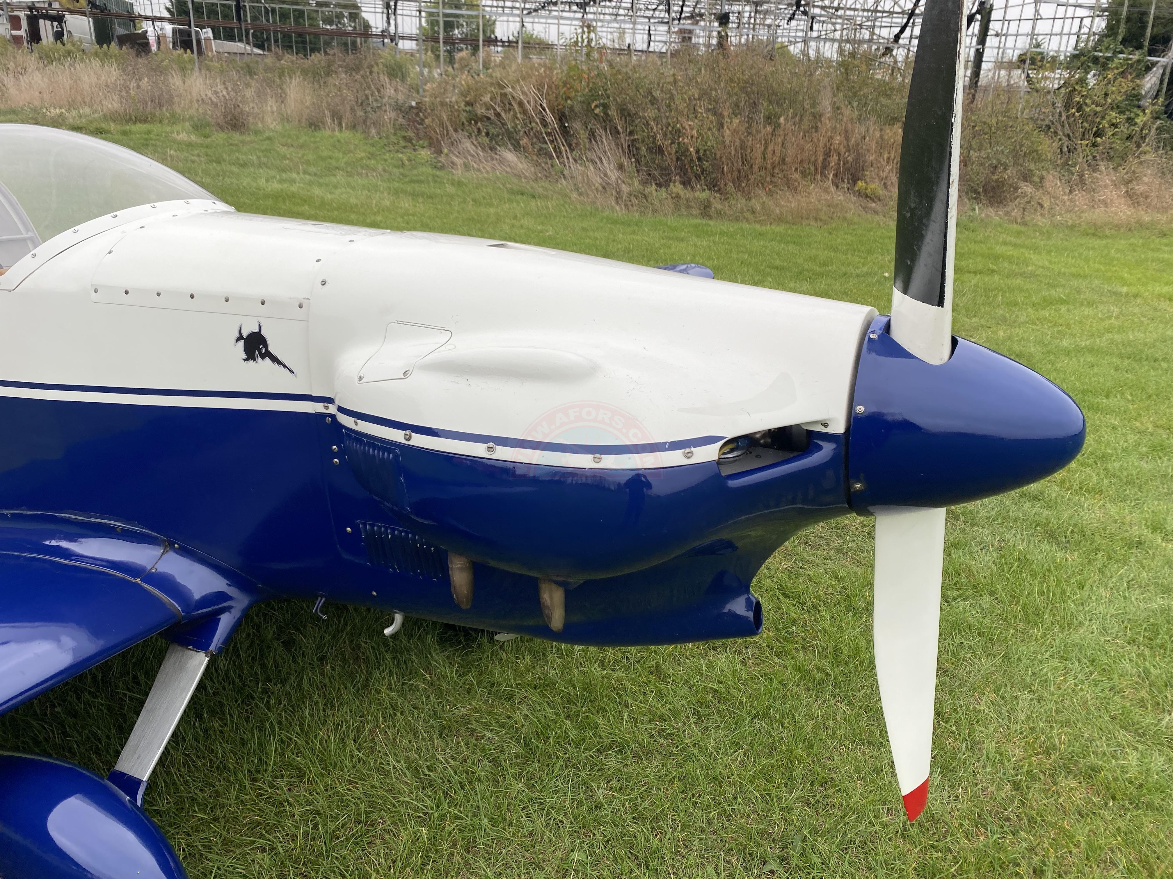 The sun shines on the mountains and trees (by Adam Kool on Unsplash)