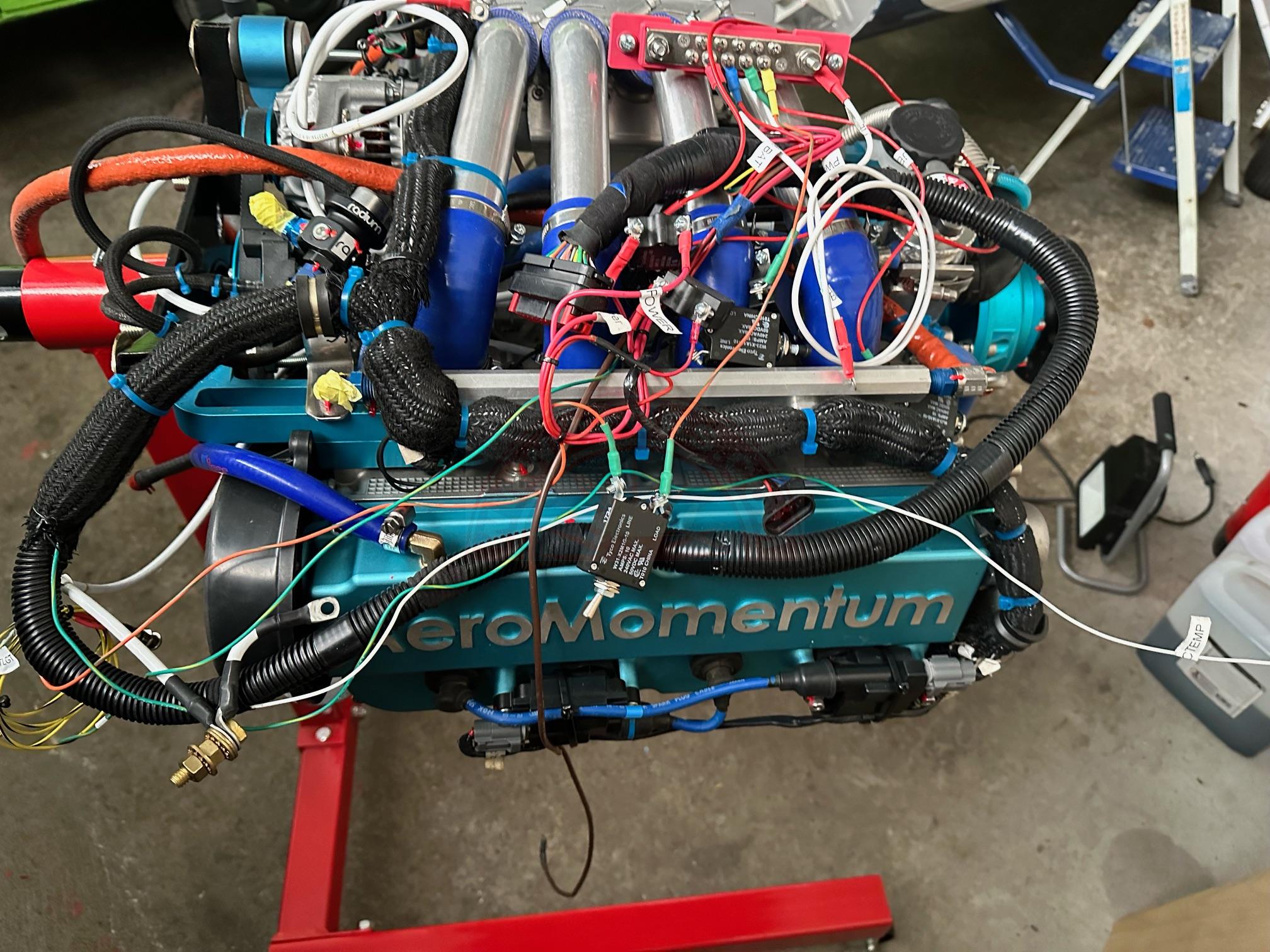 The sun shines on the mountains and trees (by Adam Kool on Unsplash)