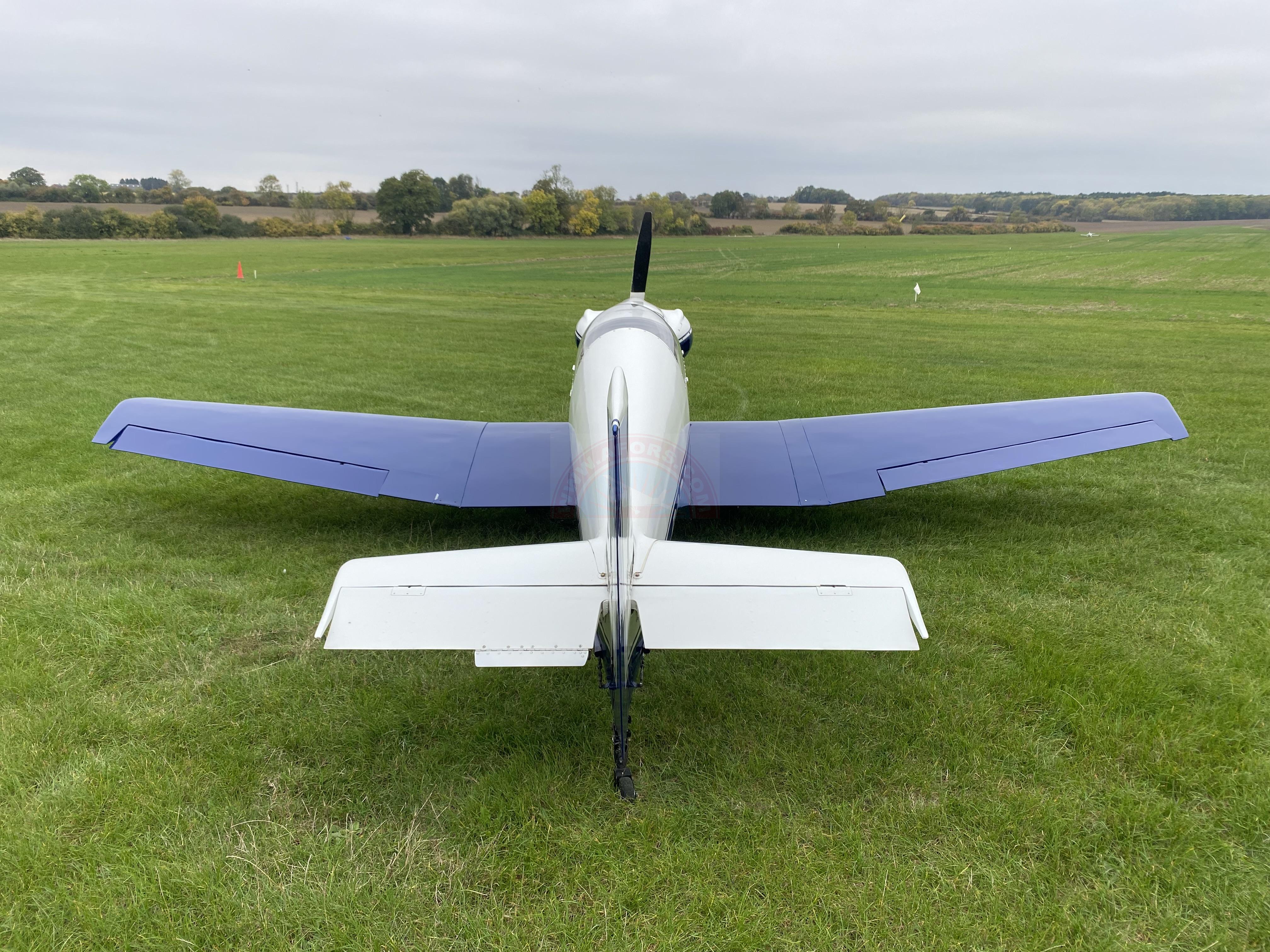 The sun shines on the mountains and trees (by Adam Kool on Unsplash)