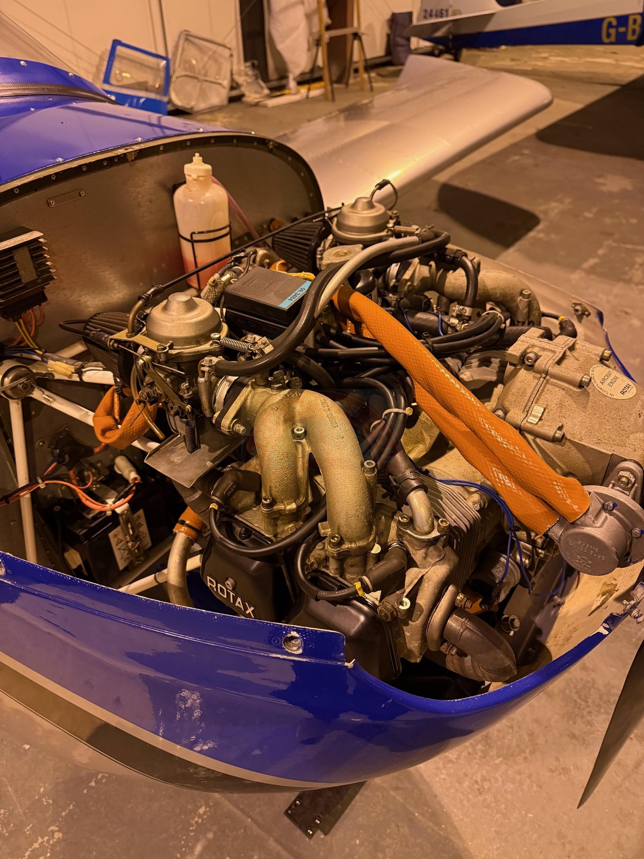 The sun shines on the mountains and trees (by Adam Kool on Unsplash)