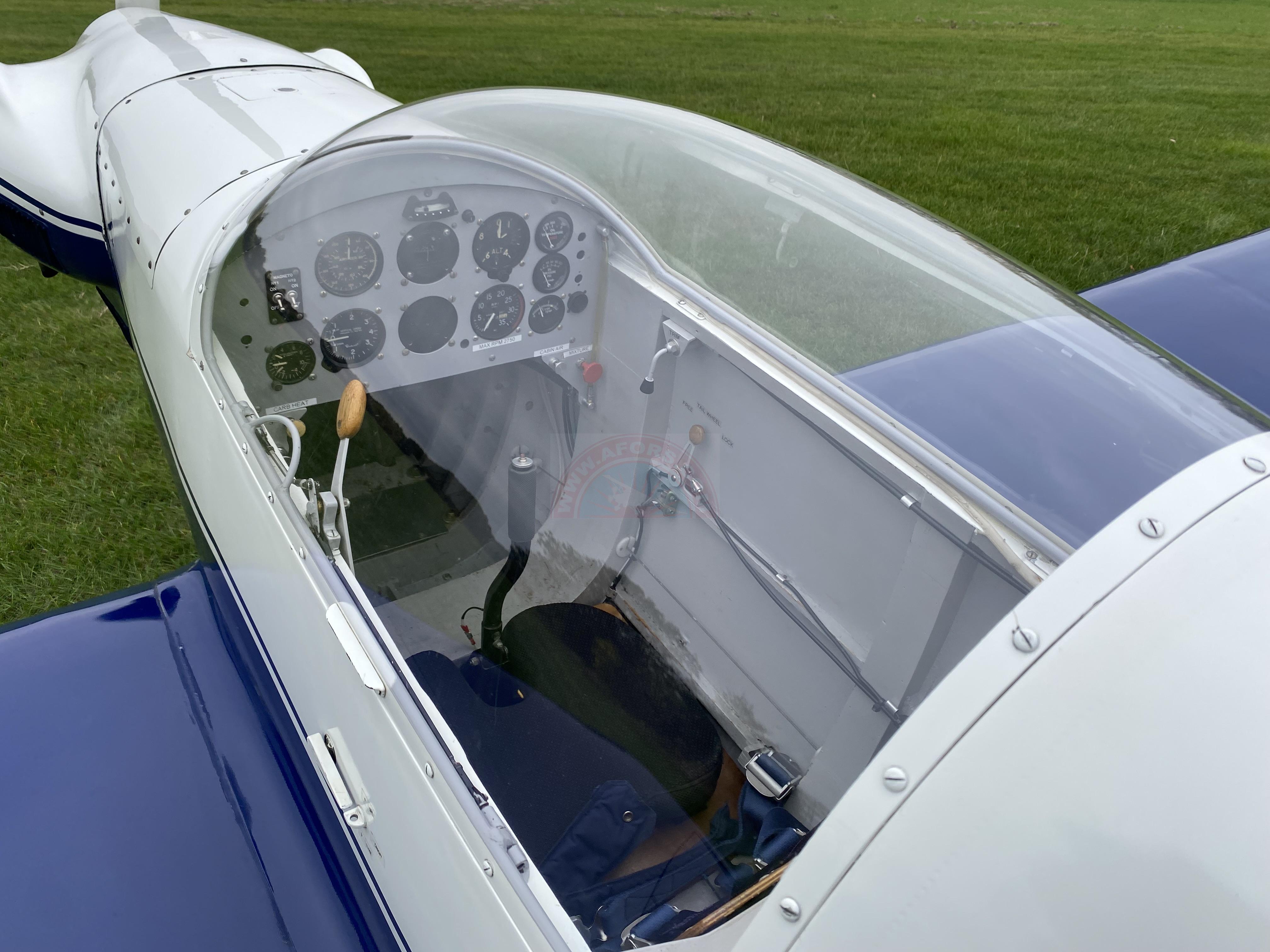 The sun shines on the mountains and trees (by Adam Kool on Unsplash)