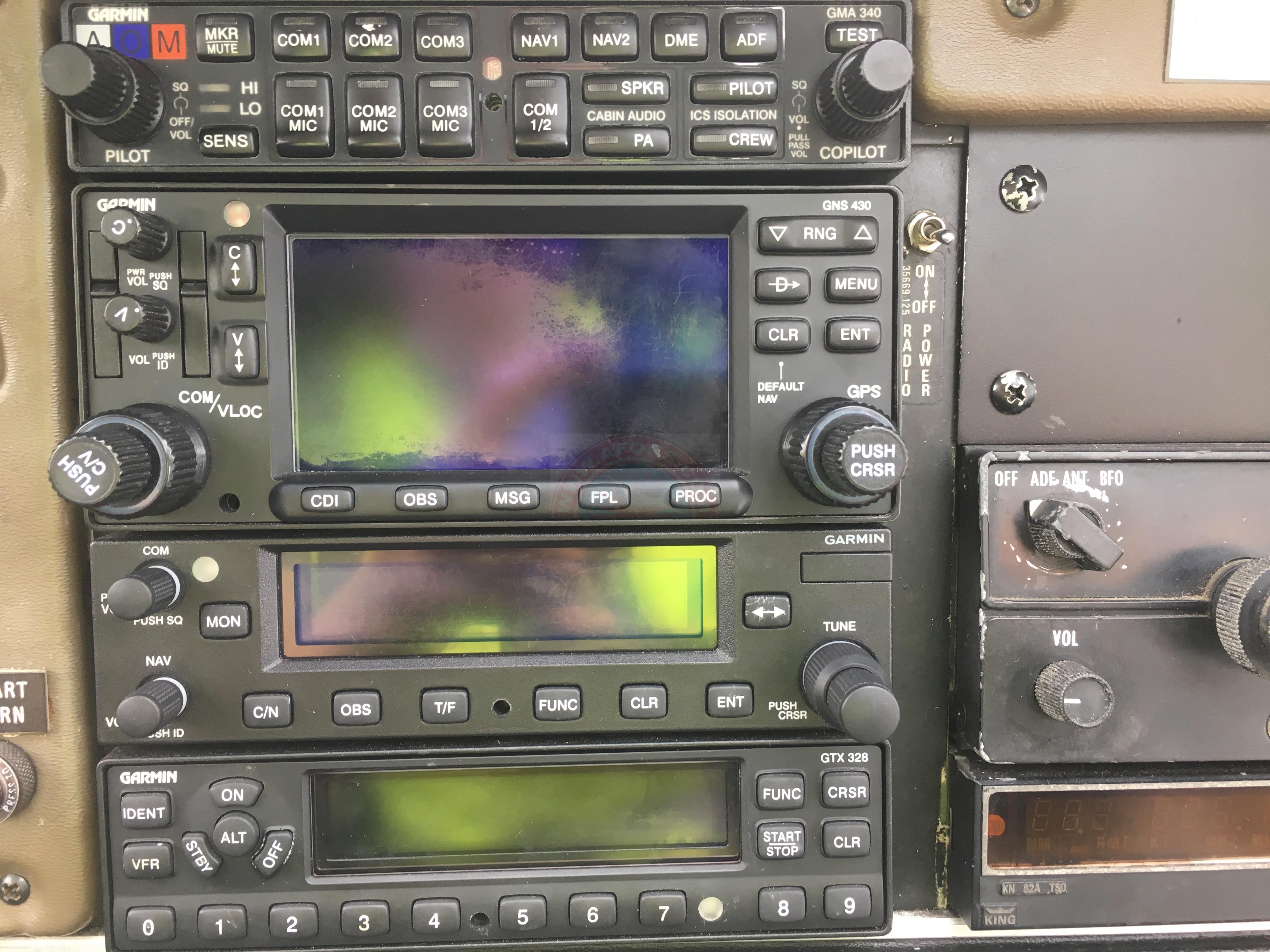 The sun shines on the mountains and trees (by Adam Kool on Unsplash)