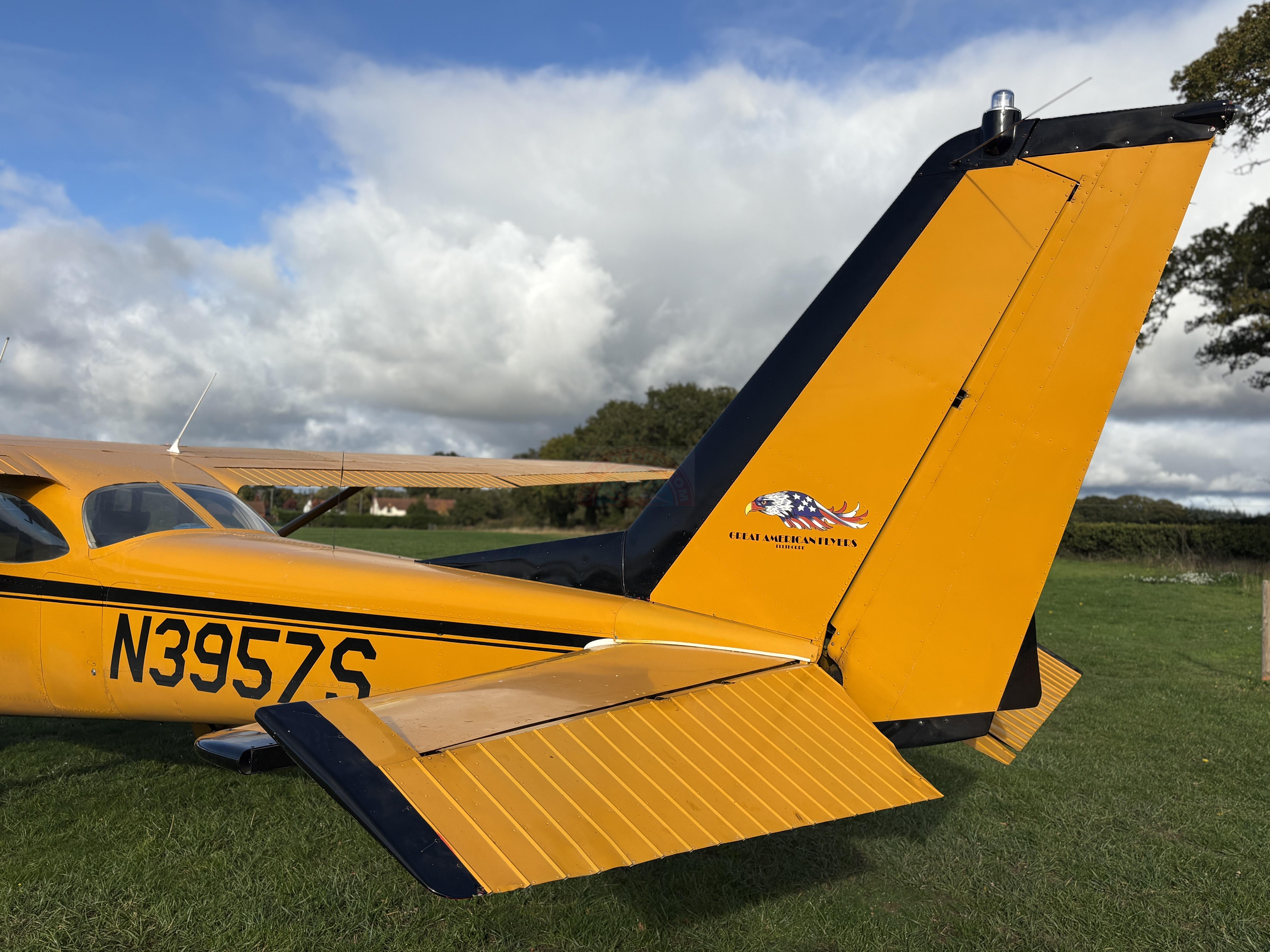 The sun shines on the mountains and trees (by Adam Kool on Unsplash)