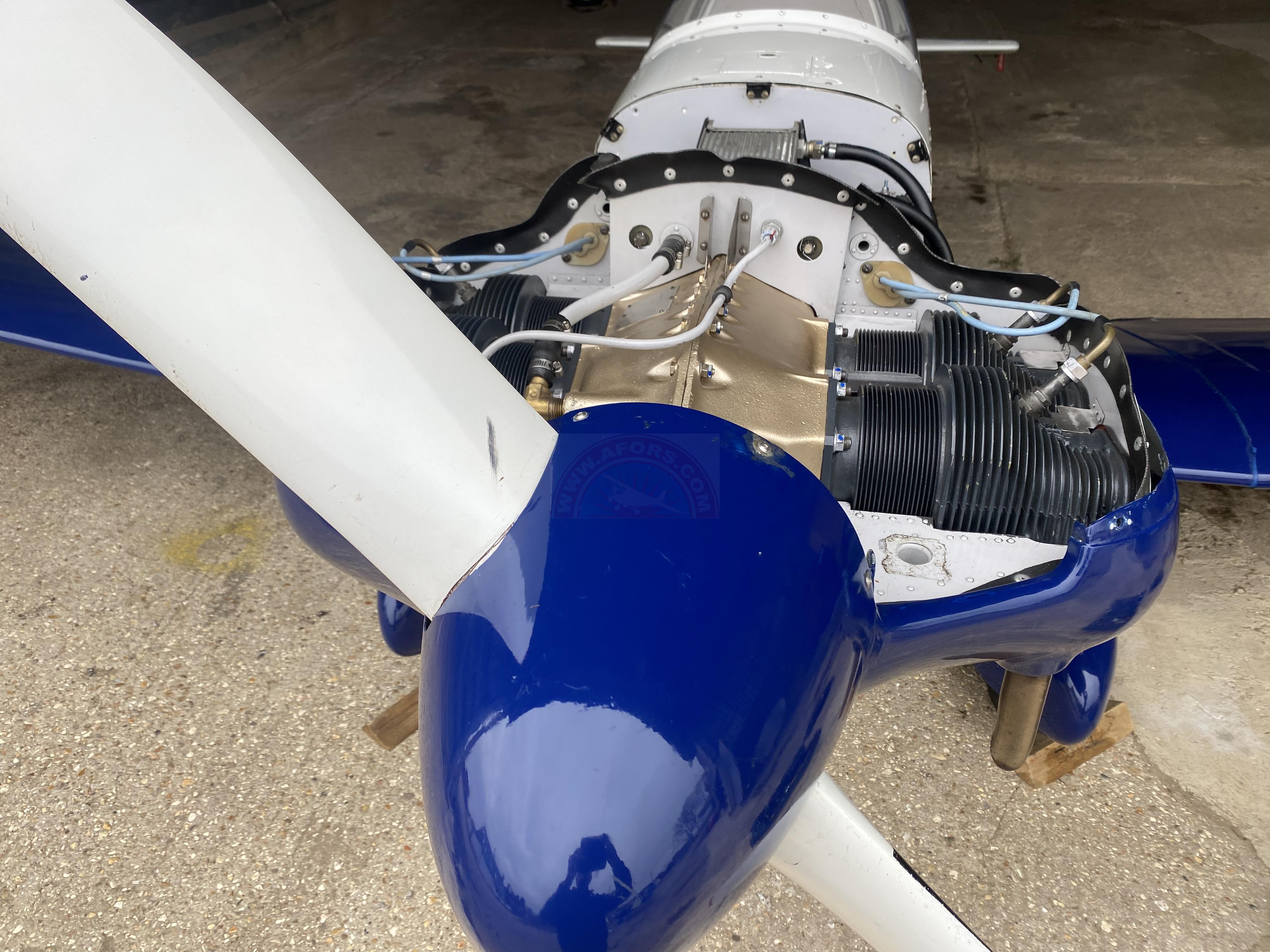 The sun shines on the mountains and trees (by Adam Kool on Unsplash)