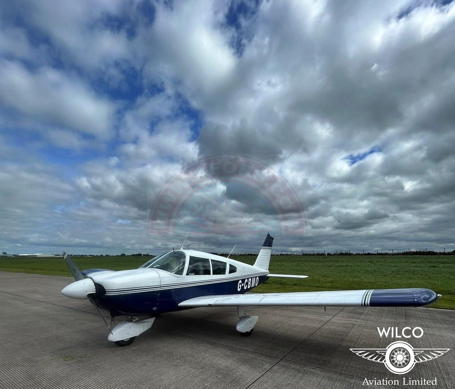 The sun shines on the mountains and trees (by Adam Kool on Unsplash)