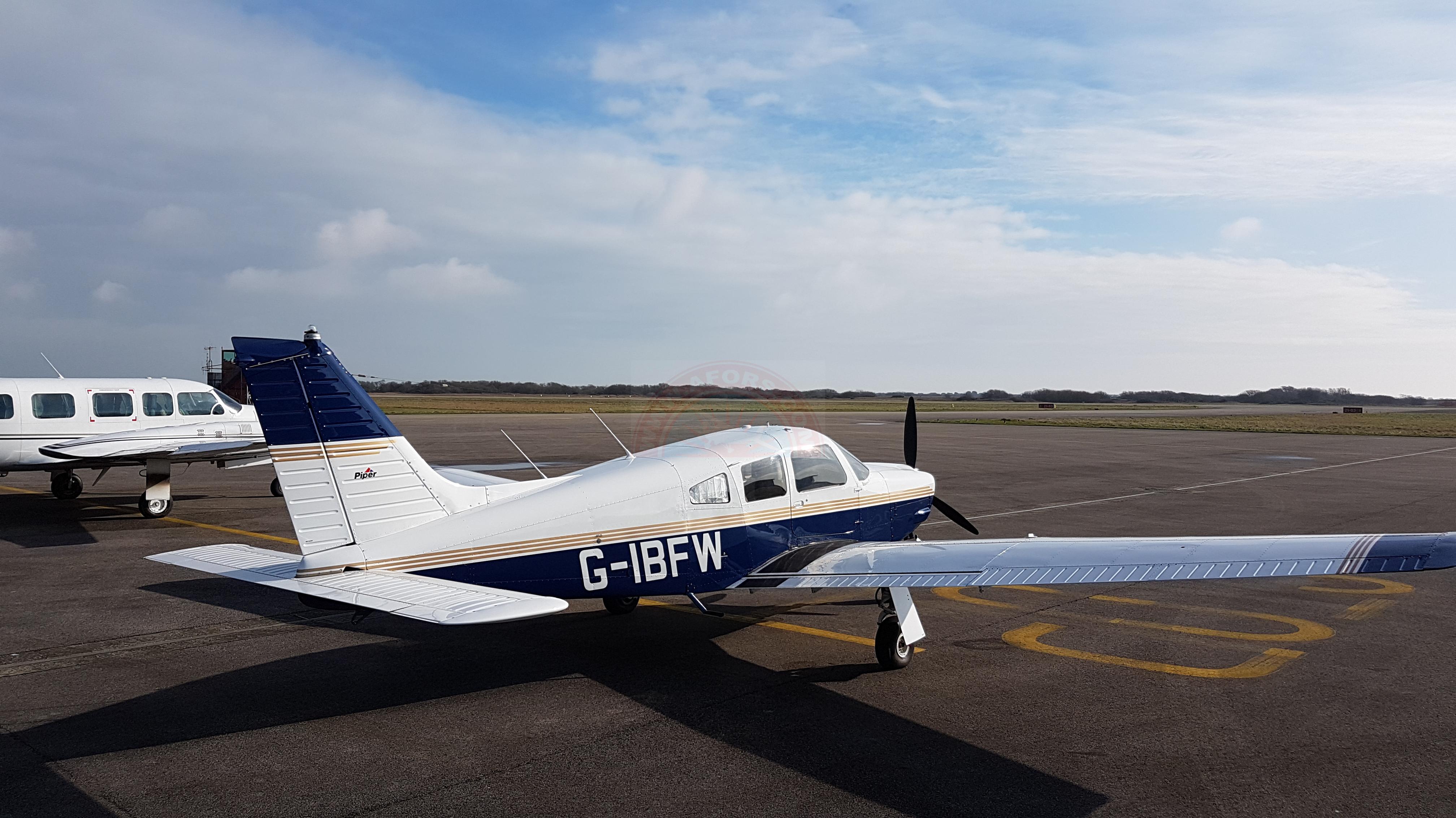 The sun shines on the mountains and trees (by Adam Kool on Unsplash)
